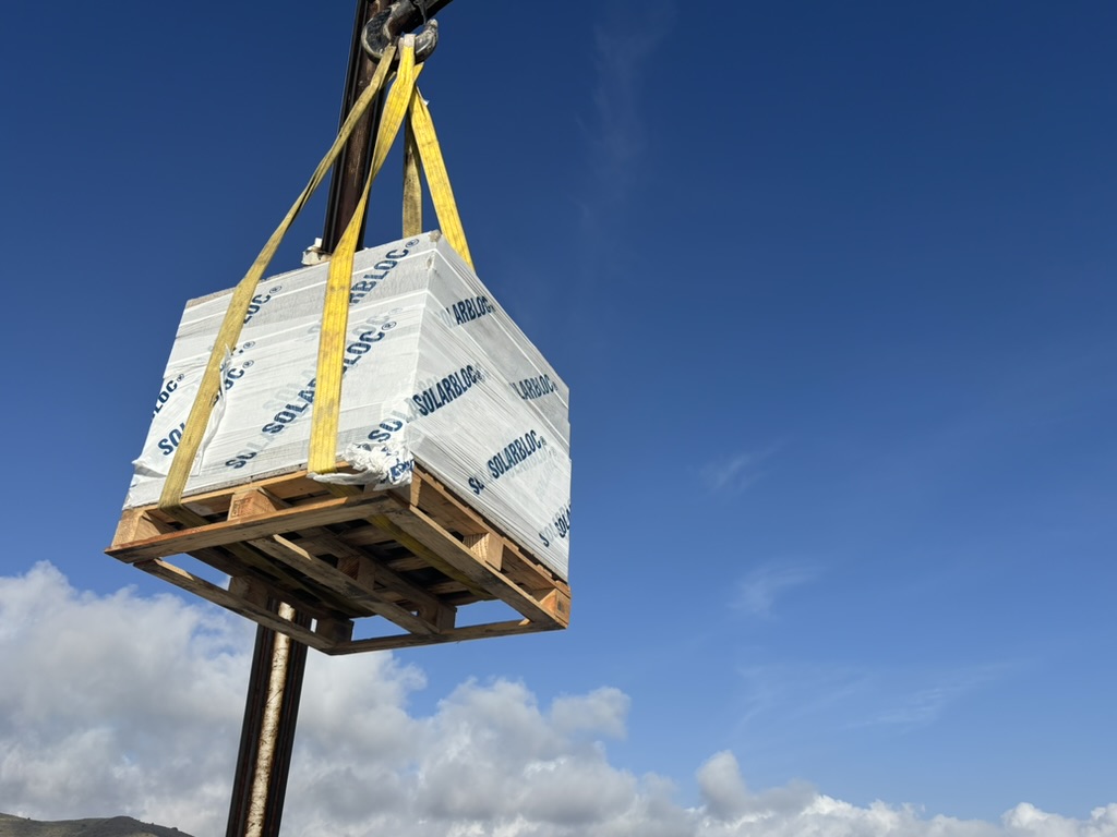 Lifting ballast blocks for a solar installation with no roof penetration